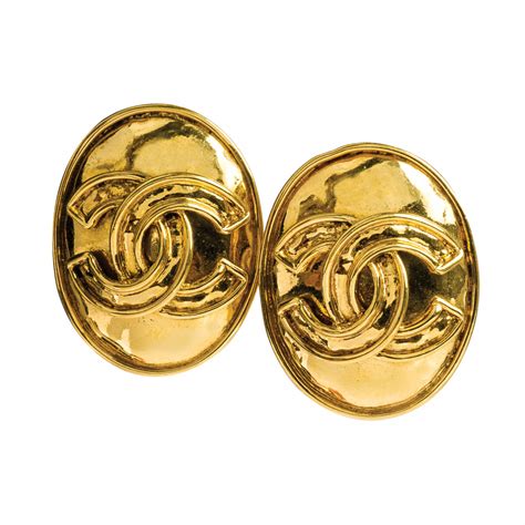 faux chanel logo earrings.